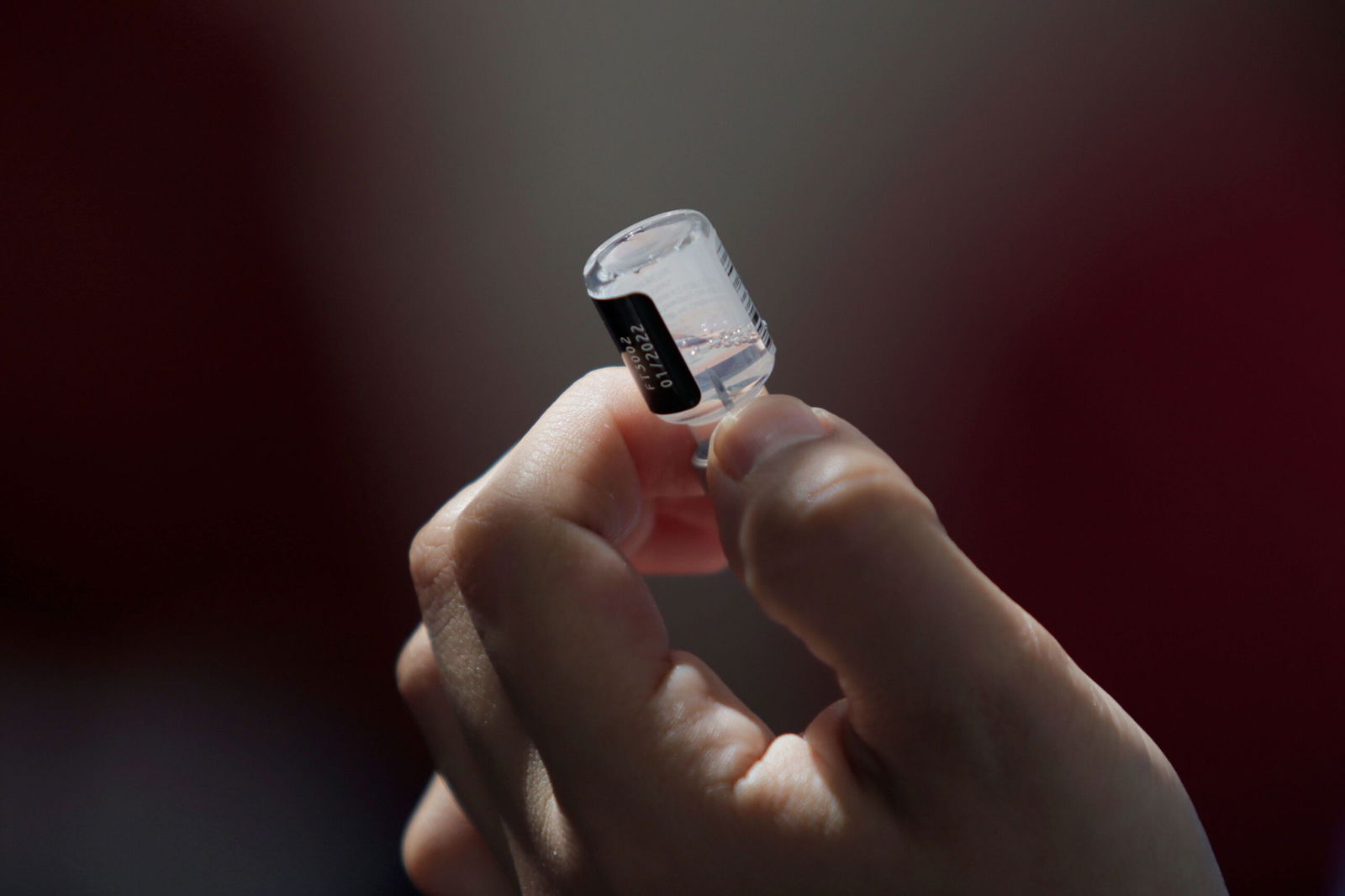 <i>Gerardo Vieyra/NurPhoto/AP via CNN Newsource</i><br/>Medical staff prepare a syringe with the Pfizer-BioNTech biologic in Mexico City. The US Health and Human Services is “winding down” its mRNA vaccine development.