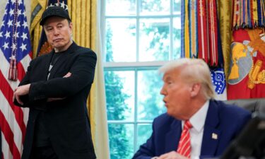 US President Donald Trump and Elon Musk attend a press conference in the Oval Office of the White House in Washington