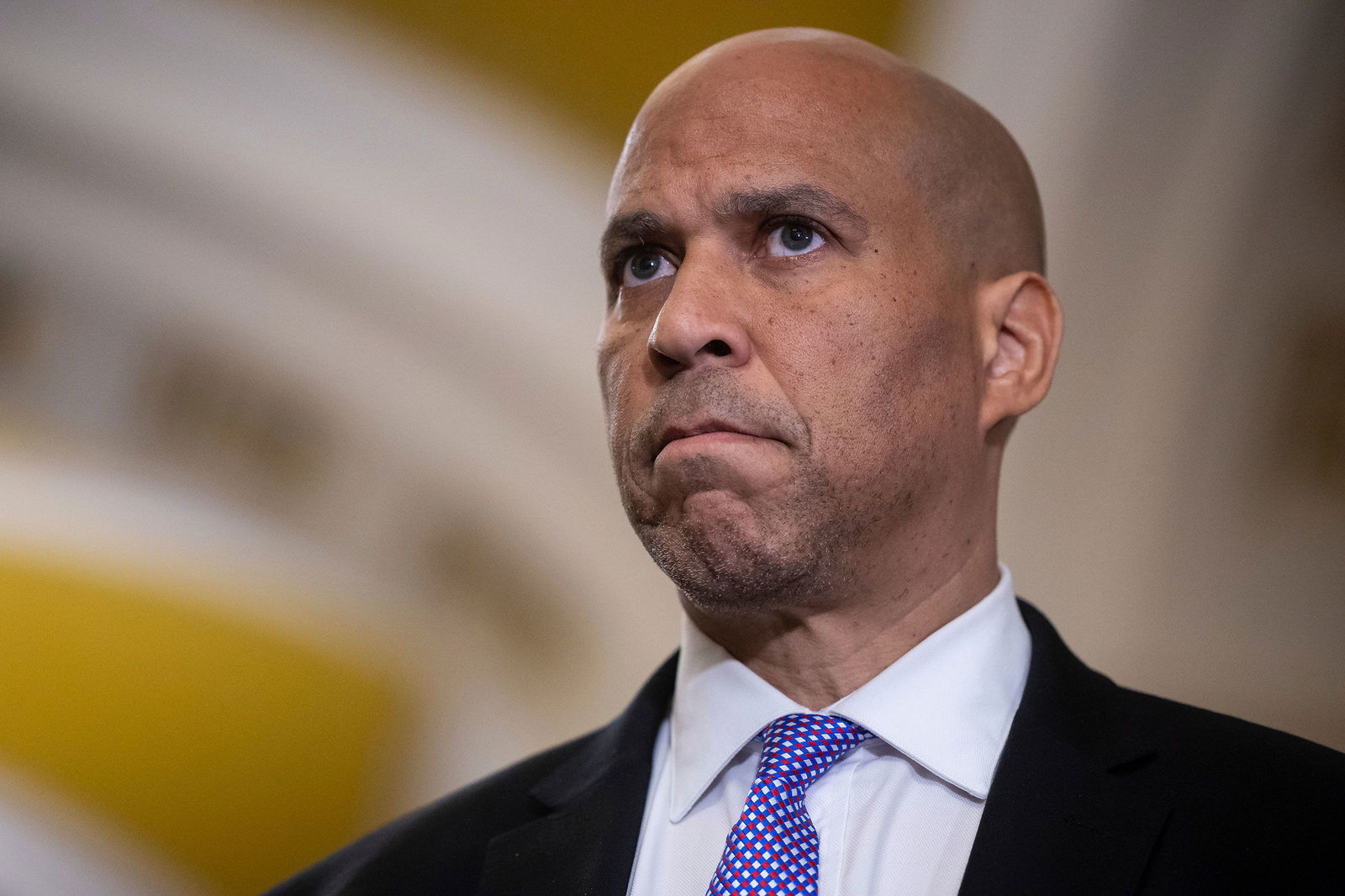 <i>Francis Chung/Politico/AP/File via CNN Newsource</i><br/>Sen. Cory Booker looks on during a press conference at the US Capitol July 22