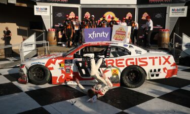 Connor Zilisch slips and falls off his car after winning the NASCAR Xfinity Series' latest race.