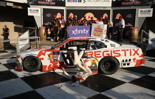Connor Zilisch slips and falls off his car after winning the NASCAR Xfinity Series' latest race.