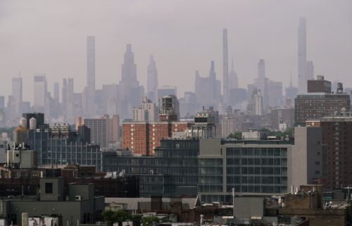 Cooling towers and air conditioning units are shown in Harlem as Legionnaires' disease cases rise.