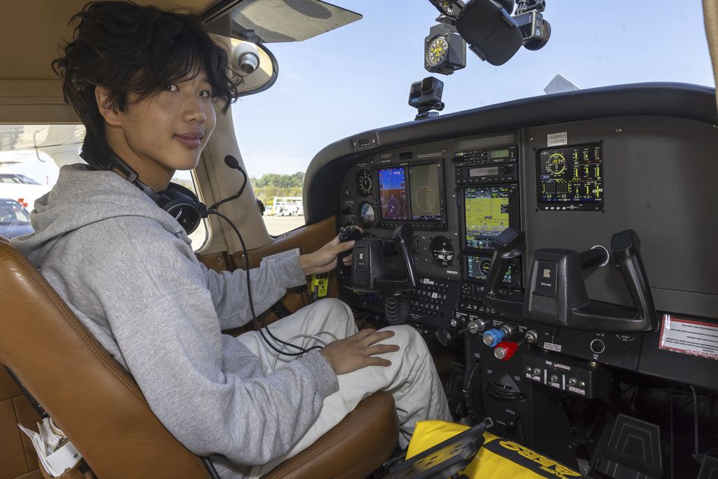 <i>Salvatore Di Nolfi/AP via CNN Newsource</i><br/>American pilot Ethan Guo poses for the photographer before his take off in a world record attempt to fly solo to all seven continents