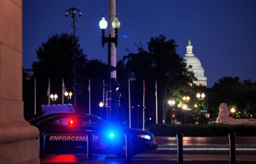 A law enforcement vehicle stands in front of Union Station near the US Capitol in Washington