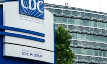 Bullet holes were seen Saturday in windows at the Centers for Disease Control Global Headquarters