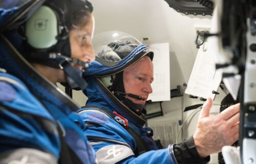 Astronauts Suni Williams (left) and Butch Wilmore train at NASA’s Johnson Space Center in 2022. Wilmore is retiring from NASA less than five months after he returned from﻿ a troubled test mission.