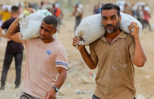 A view from the air as Jordanian air force personnel perform an air drop of aid and humanitarian supplies in Gaza on August 6.