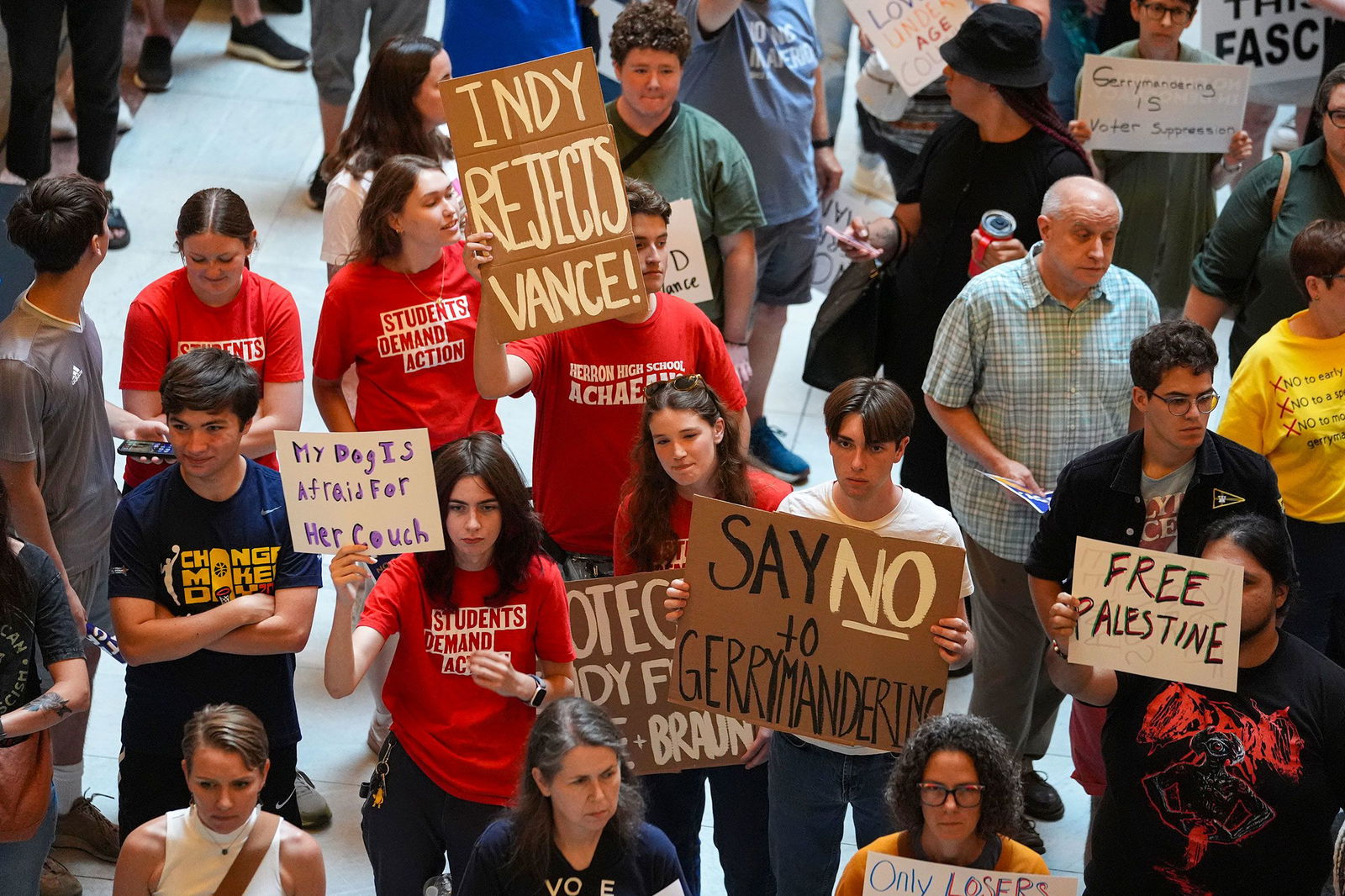 <i>Michael Conroy/AP via CNN Newsource</i><br/>Protestors cheer during a really against redistricting at the Indiana Statehouse in Indianapolis