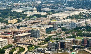 An aerial view of the US Capitol building and Washington