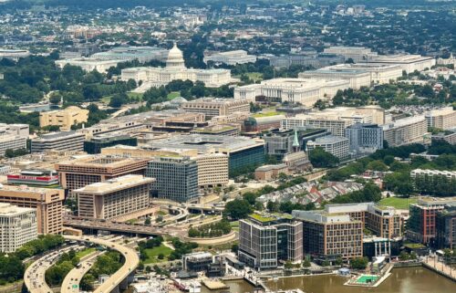 An aerial view of the US Capitol building and Washington