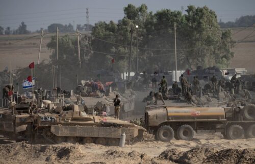 A damaged Israeli flag stands in Gaza