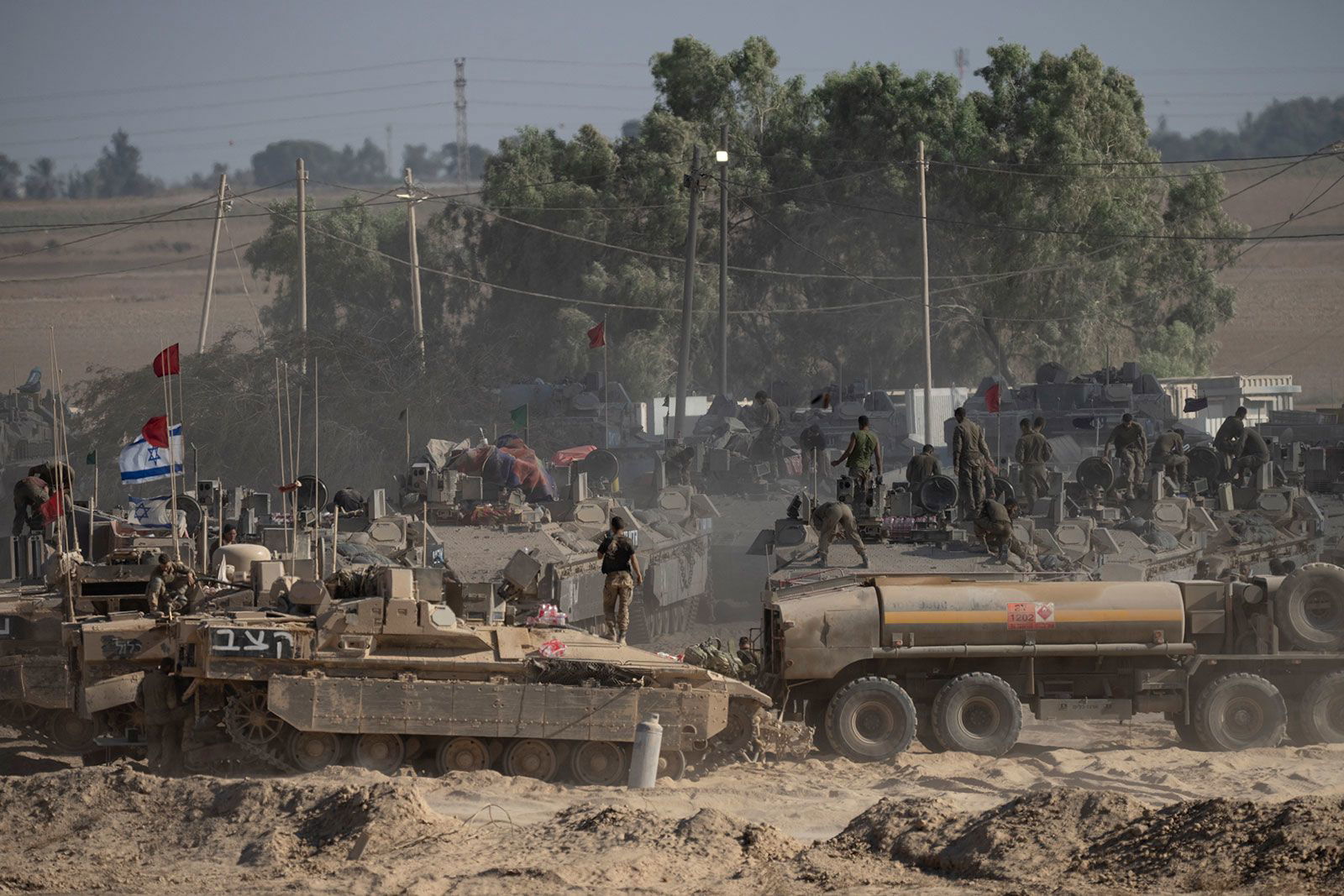 <i>Amir Cohen/Reuters via CNN Newsource</i><br/>A damaged Israeli flag stands in Gaza