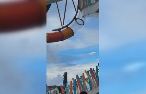 A photo taken by a cruise passengers shows a hole in an acrylic waterslide on Icon of the Seas.