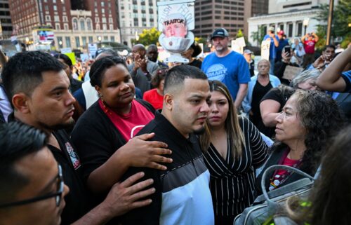 Salvadoran migrant and US resident Kilmar Abrego Garcia walks with his wife Jennifer Vasquez as he arrives at a US Immigration and Customs Enforcement (ICE) field office in Baltimore