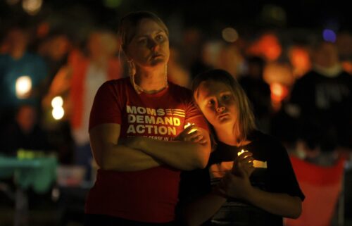 People attend a vigil following a mass shooting at Annunciation Catholic School on Wednesday in Minneapolis.