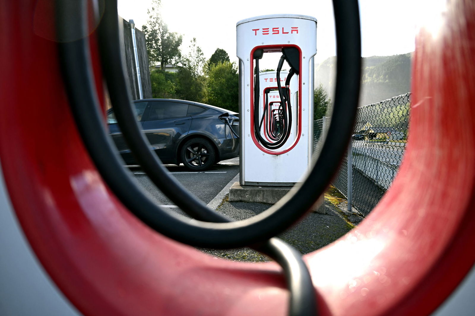 <i>John Thys/AFP/Getty Images via CNN Newsource</i><br/>Tesla electric cars are stationed in a storage area in the Zeebrugge port