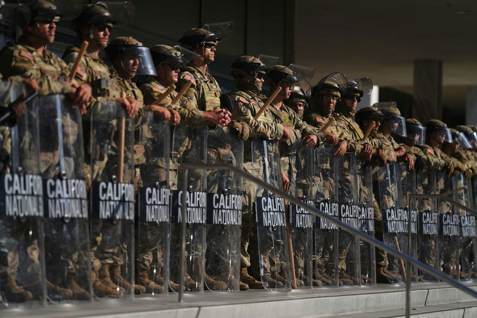 <i>Eric Thayer/AP via CNN Newsource</i><br/>California National Guard members are positioned at the Federal Building in downtown Los Angeles on June 10.