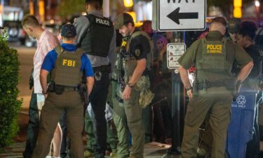 FBI and Border Patrol officers arrest a man