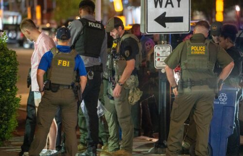 FBI and Border Patrol officers arrest a man