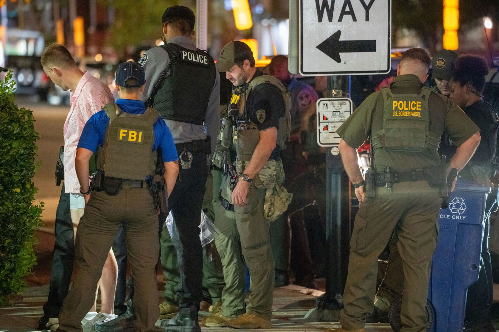 <i>Andrew Leyden/Getty Images via CNN Newsource</i><br/>FBI and Border Patrol officers arrest a man