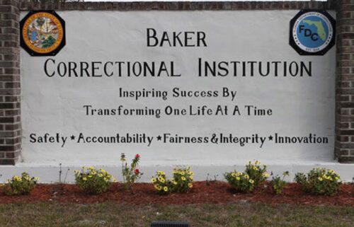 This undated image provided by the Florida Department of Corrections shows signage for the Baker Correctional Institution