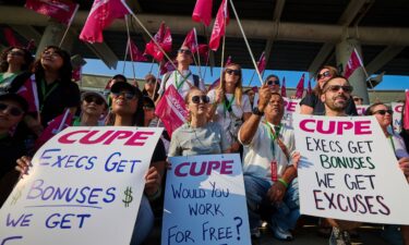 Air Canada flight attendants picket at Pearson International Airport in Toronto on Aug. 16.