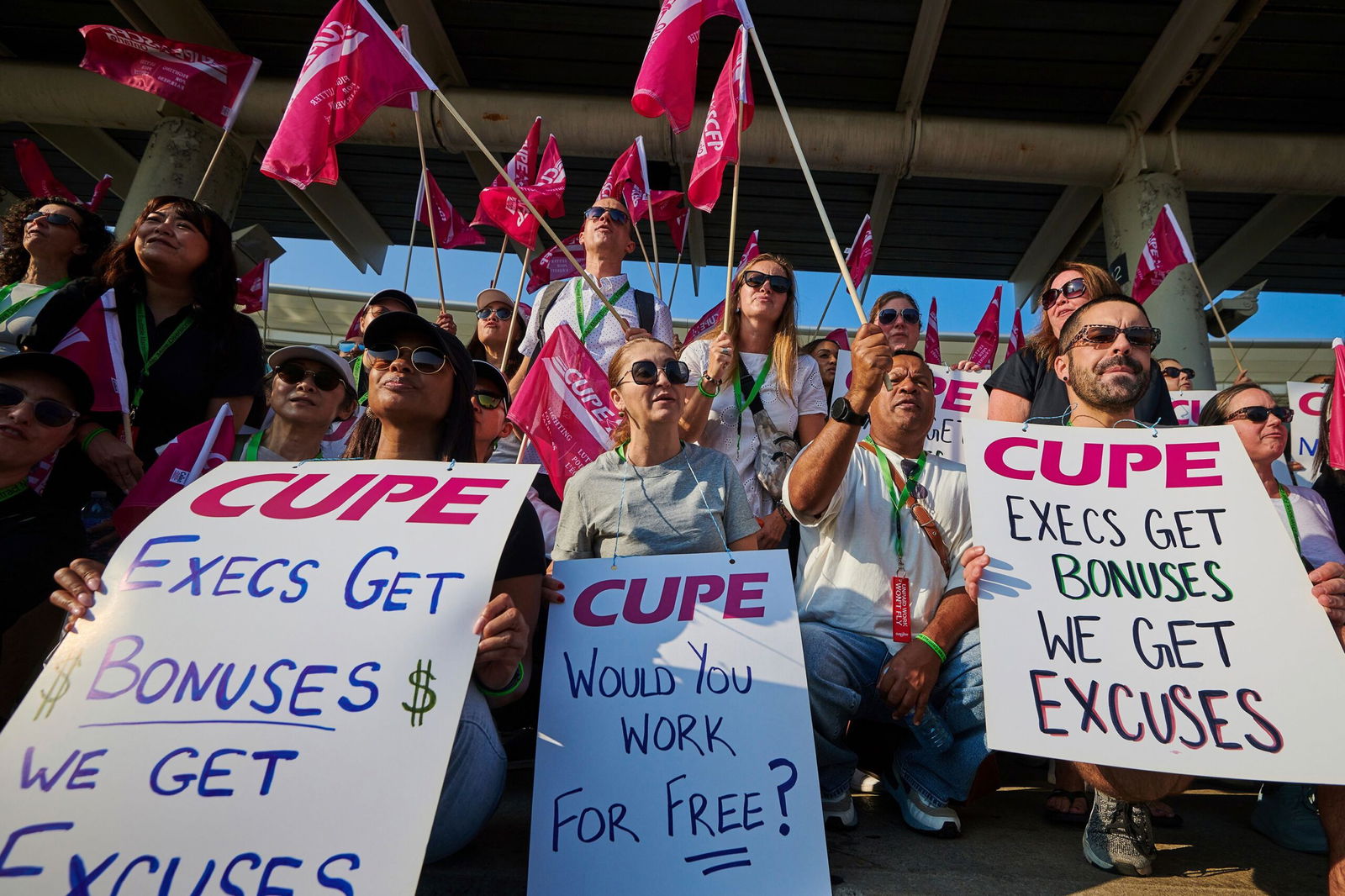 <i>Sammy Kogan/The Canadian Press/AP via CNN Newsource</i><br/>Air Canada flight attendants picket at Pearson International Airport in Toronto on Aug. 16.