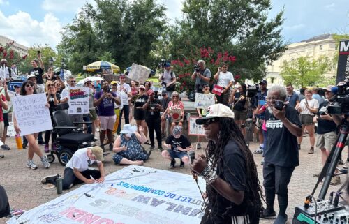 Demonstrators gather near police headquarters to protest Donald Trump’s federal takeover of Washington