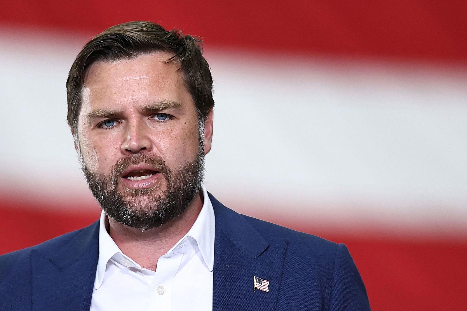 <i>Henry Nicholls/AFP/Getty Images/File via CNN Newsource</i><br/>Vice President JD Vance delivers a speech during a visit to RAF Fairford in southwest England on August 13.