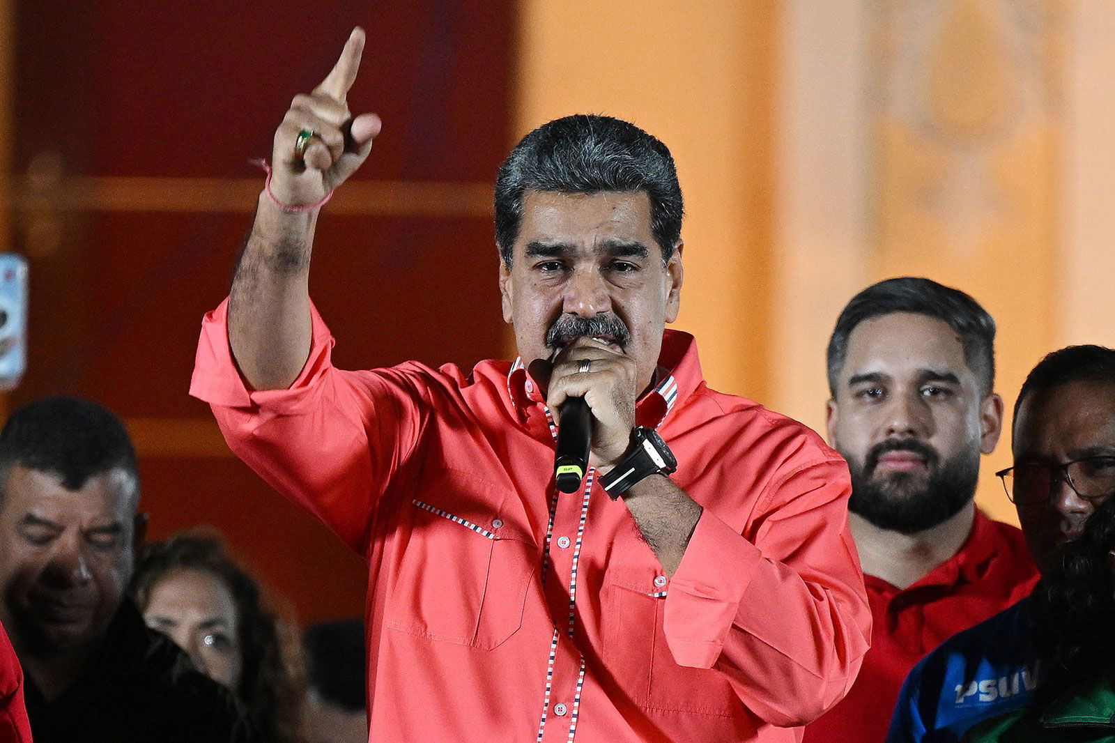 <i>Federico Parra/AFP/Getty Images/File via CNN Newsource</i><br/>Venezuelan President Nicolas Maduro speaks to supporters in Caracas on May 25.