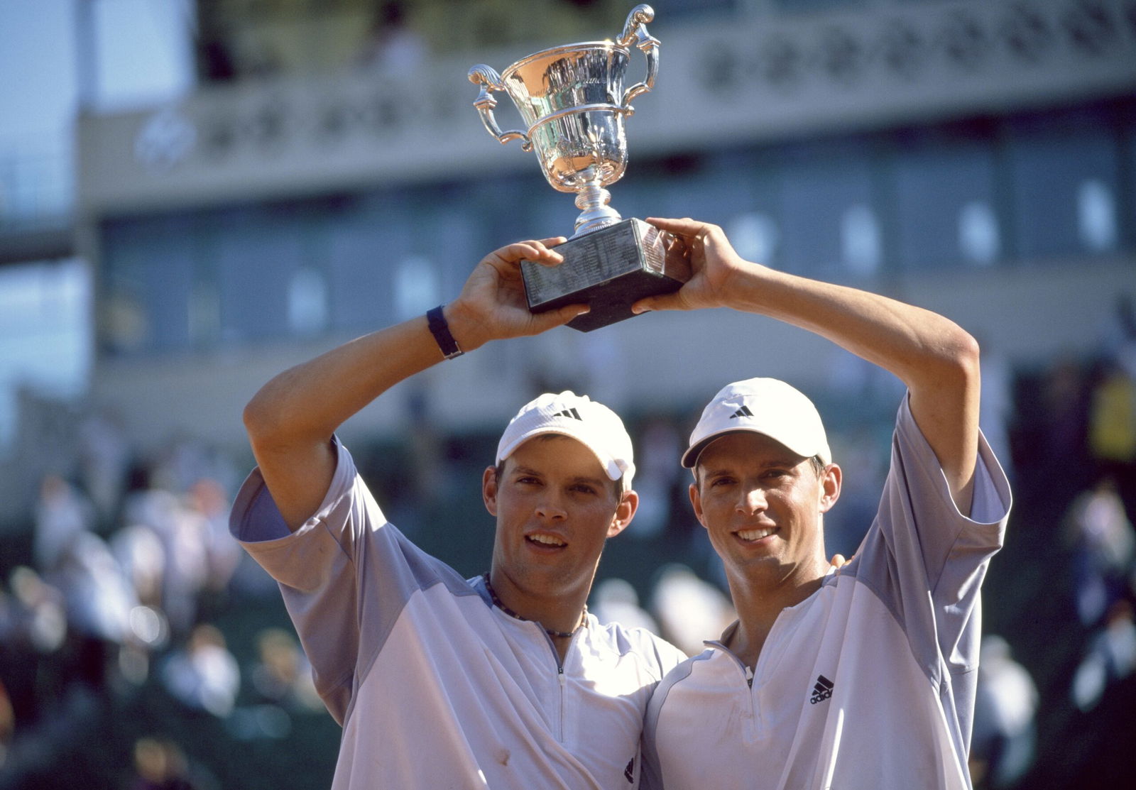 <i>Professional Sport/Popperfoto/Getty Images via CNN Newsource</i><br/>Michael Bryan and Bob Bryan lift the trophy after their win in the men's doubles final of the French Open in 2003.
