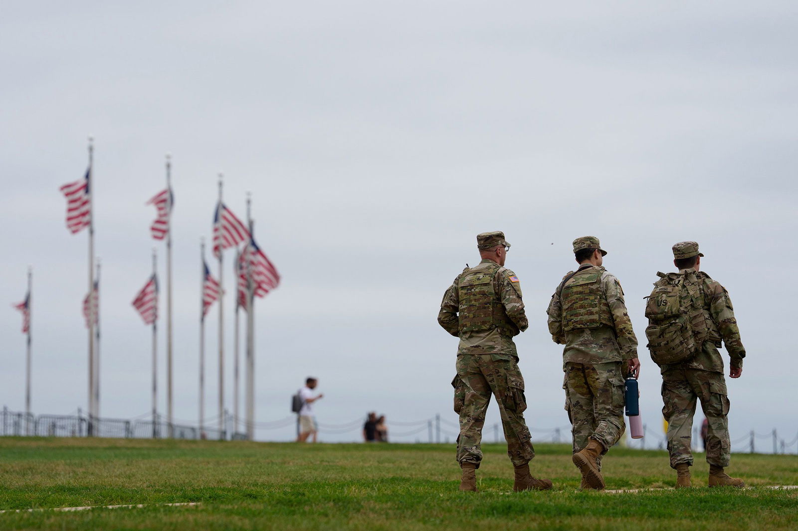 <i>Aaron Schwartz/Sipa USA/AP via CNN Newsource</i><br/>Members of the National Guard patrol on the National Mall in Washington