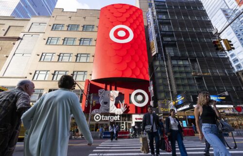 People walk in front of the Target Store in Times Square on May 15 in New York City. Target CEO Brian Cornell is stepping down after 11 years amid struggles at one of America’s most prominent retail chains.