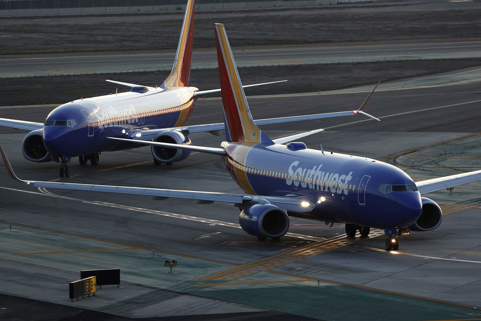 <i>Kevin Carter/Getty Images via CNN Newsource</i><br/>Southwest Airlines Boeing 737 airplanes taxi before departing from San Diego International Airport. The airline confirmed it is considering adding long-haul international flights for the first time.