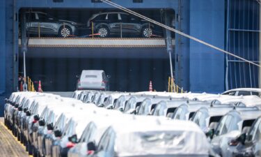 Cars loaded onto a carrier ship in Germany for export. The lower tariffs on US imports from the EU won't go into effect as early as previously believed