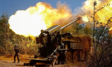 A Ukrainian service member fires a self-propelled howitzer towards Russian troops near a front line in Ukraine's Zaporizhzhia region