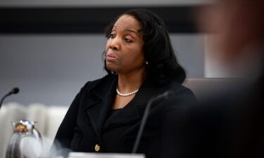 Federal Reserve Governor Lisa Cook is seen here at a Federal Reserve Board meeting in Washington