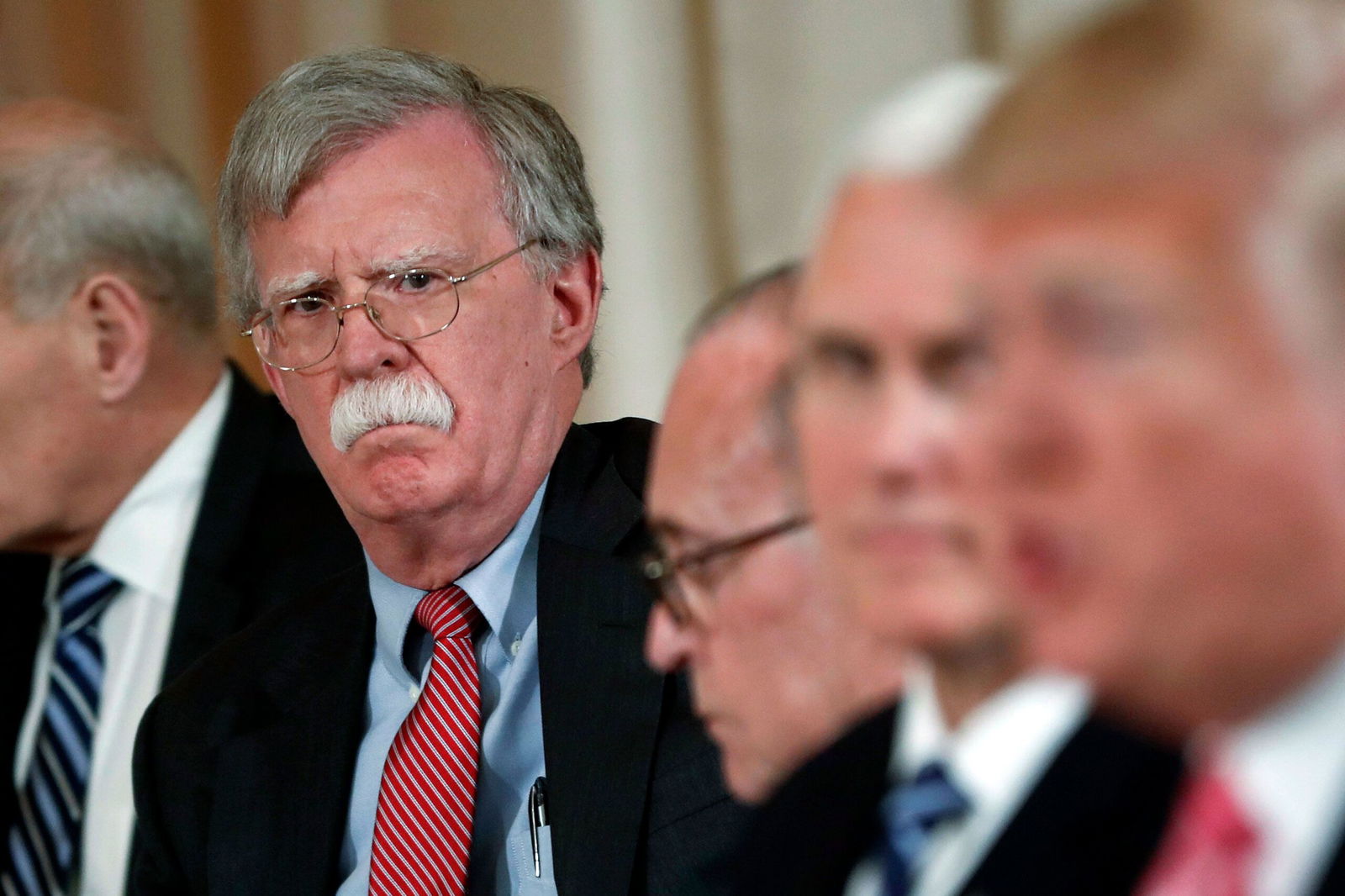 <i>Pablo Martinez Monsivais/AP/FILE via CNN Newsource</i><br/>John Bolton listens to President Donald Trump speak during a working lunch in Palm Beach