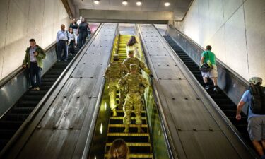 Members of the National Guard patrol a Metro station in Washington DC on August 20.