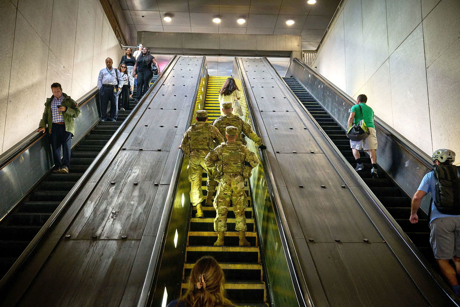<i>Dominic Gwinn/Middle East Images/AFP/Getty Images via CNN Newsource</i><br/>Members of the National Guard patrol a Metro station in Washington DC on August 20.