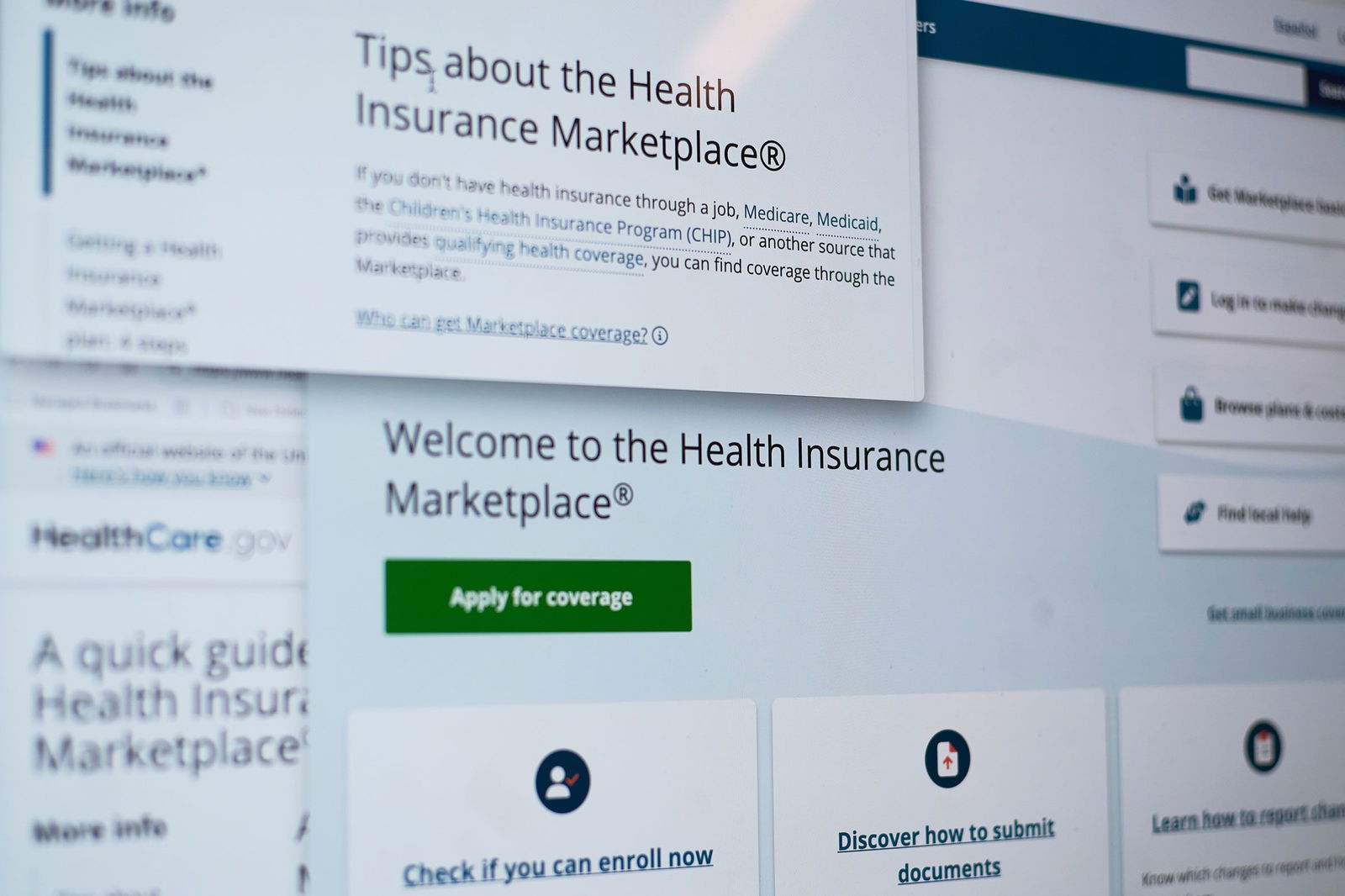 <i>Patrick Sison/AP via CNN Newsource</i><br/>Pages from the Affordable Care Act health insurance website are seen on a computer screen in New York on Tuesday.