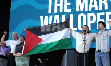 The Mary Wallopers demonstrate onstage during Day 1 of Victorious Festival on August 22