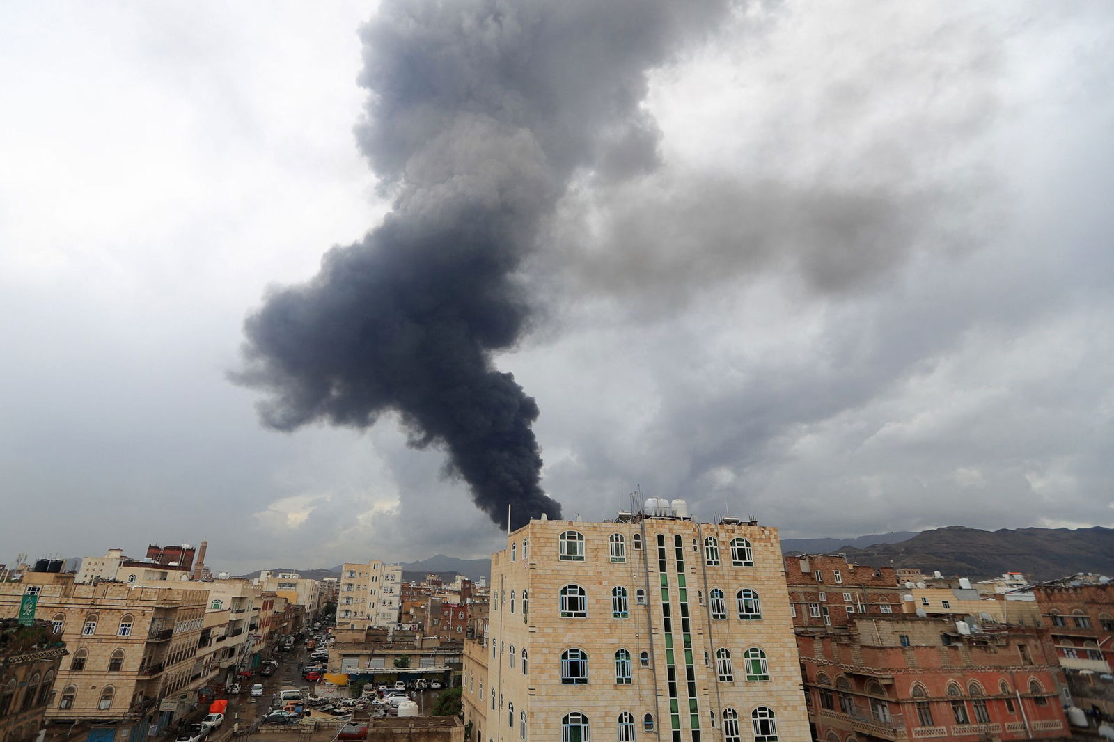 <i>Mohammed Huwais/AFP/Getty Images via CNN Newsource</i><br/>Smoke billows after an Israeli airstrike on Yemen's Houthi-held capital Sanaa on August 24.