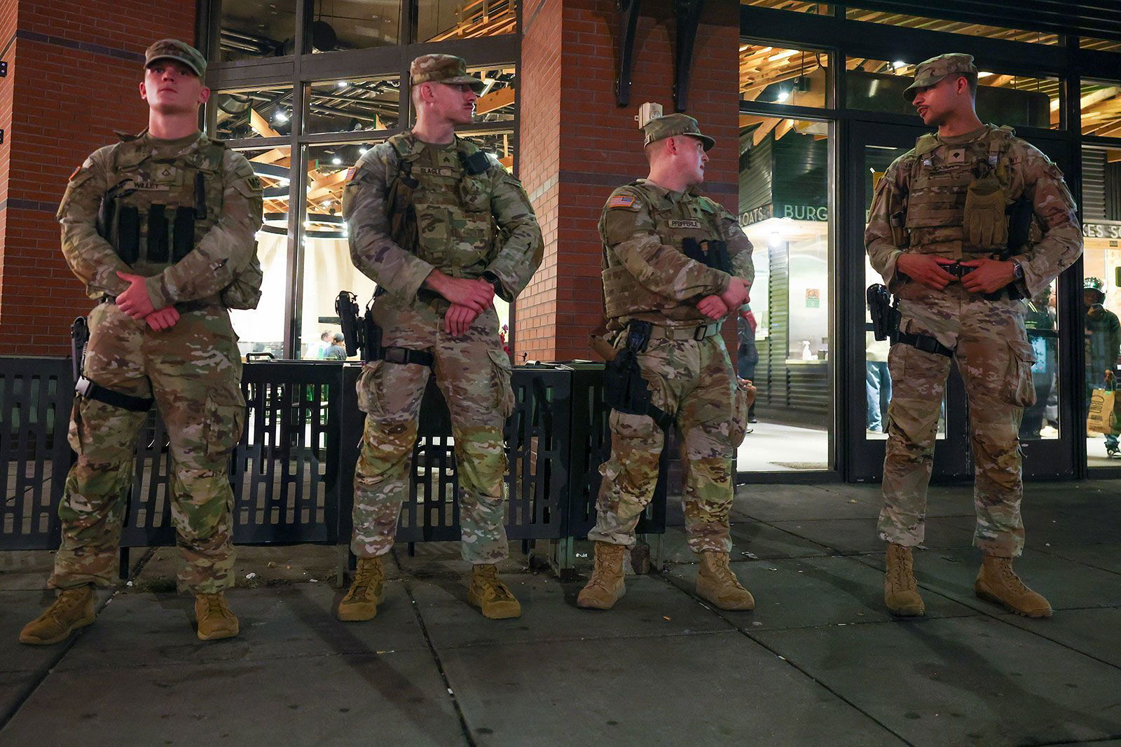 Members of the Ohio National Guard wear their sidearms while patrolling in the Logan Circle neighborhood