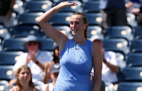 Kvitova embraces her husband and coach Jiří Vaněk after her final match.
