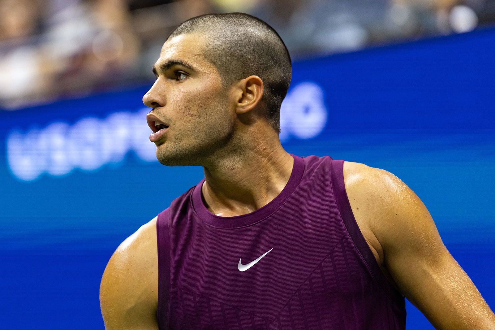 <i>Mike Frey/Imagn Images/Reuters via CNN Newsource</i><br/>Carlos Alcaraz shows off his new trim during his first-round match at the US Open.