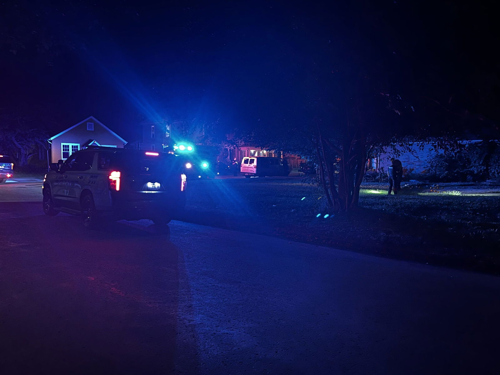 Police work the scene of an early morning shooting.