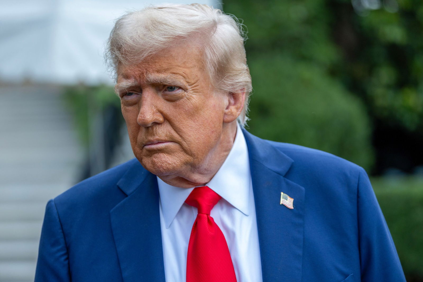 <i>Tasos Katopodis/Getty Images via CNN Newsource</i><br/>President Donald Trump talks to the media before boarding Marine One on the South Lawn of the White House on September 21.