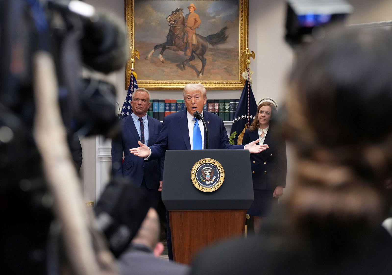 <i>Andrew Harnik/Getty Images via CNN Newsource</i><br/>US President Donald Trump answers questions after making an announcement on “significant medical and scientific findings for America’s children” on September 23 in Washington