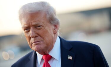 President Donald Trump speaks to reporters after stepping off Air Force One at Joint Base Andrews
